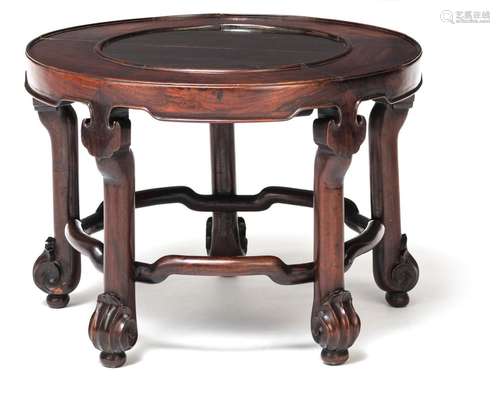 A CIRCULAR TABLE WITH 'RUYI' ELEMENTS