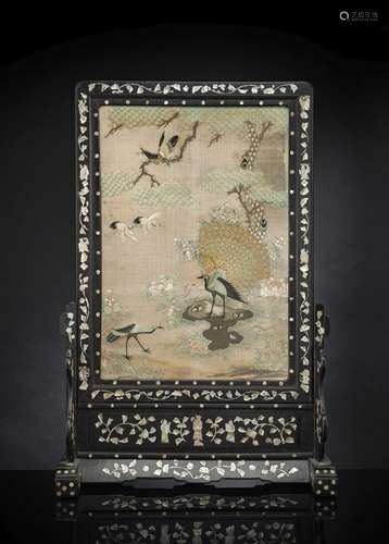 A MOTHER-OF-PEARL-INLAID WOODEN TABLE SCREEN WITH A SILK EMB...