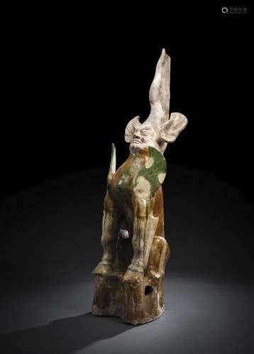 A SANCAI-GLAZED POTTERY FIGURE OF AN EARTH SPIRIT