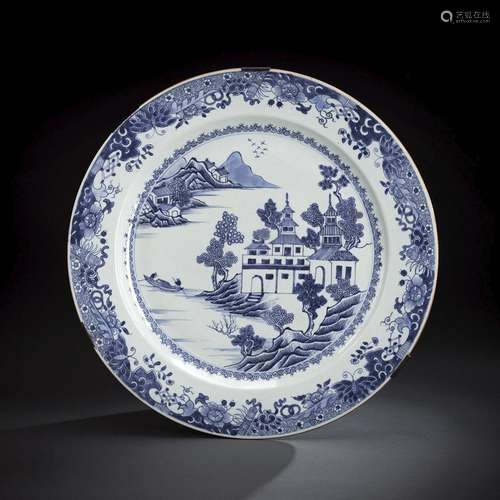 A BLUE AND WHITE PORCELAIN RIVER LANDSCAPE AND PAGODA CHARGE...