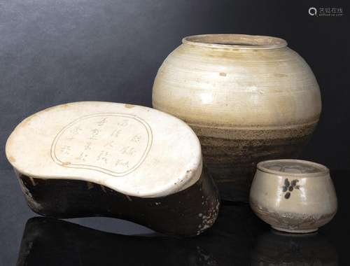 A CIZHOU NECKREST WITH ENGRAVED POEM, A CREAM GLAZED JAR AND...