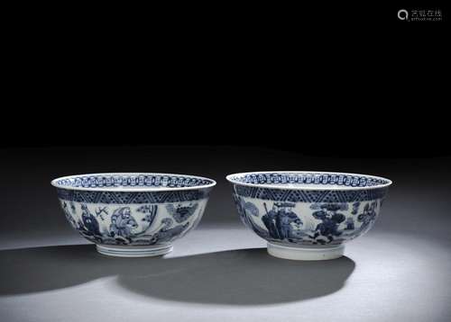 A PAIR OF BLUE AND WHITE BOWLS WITH FOREIGNORS PRESENTING TR...