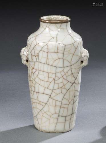 A GUAN-STYLE GLAZED PORCELAIN VASE WITH METAL RIM AT THE MOU...