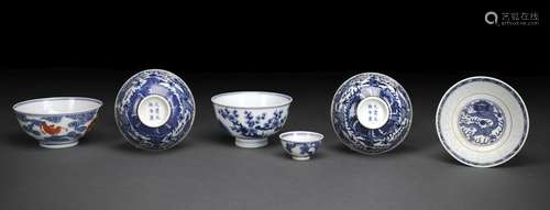 A GROUP OF SIX BLUE AND WHITE PORCELAIN BOWLS, ONE WITH IRON...