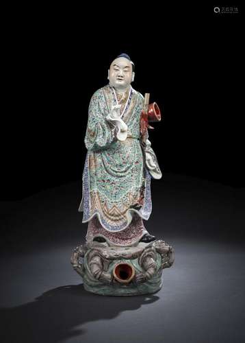 A 'FAMILLE ROSE' PORCELAIN FIGURE OF HAN XIANGZI O...