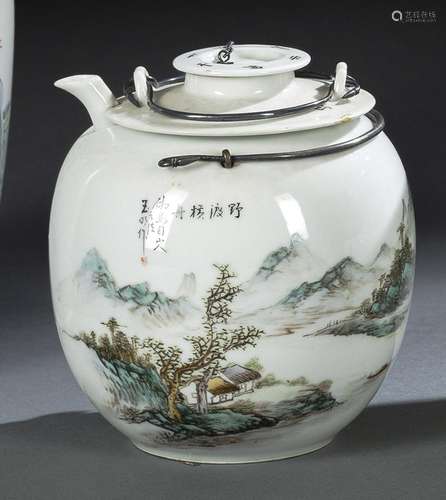 A TWO-PART PAINTED PORCELAIN TEAPOT AND COVER WITH LANDSCAPE