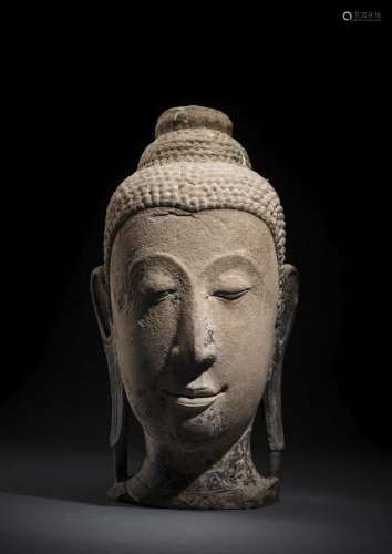 A LARGE STONE HEAD OF BUDDHA SHAKYAMUNI