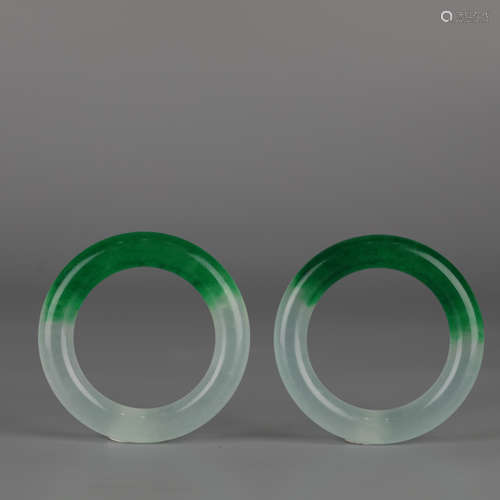 A pair of white and green jade bracelets in ancient China, Q...