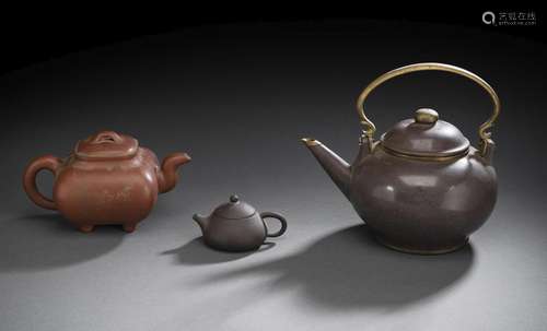 THREE ZISHA WARE TEAPOTS AND COVERS, ONE WITH METAL MOUNTS