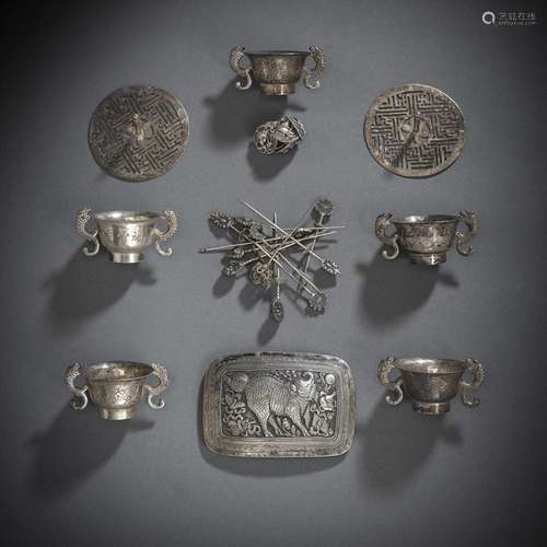 A GROUP OF SILVER WORKS WITH WINE CUPS, KNOBS, A BELT BUCKLE...