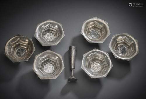 A GROUP OF SIX SEVEN-SIDED SILVER BOWLS WITH NIELLO DECORATI...