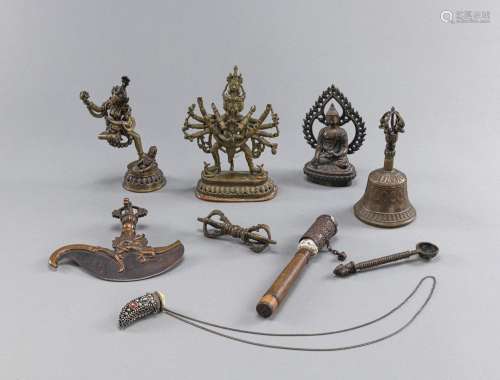 A GROUP OF RITUAL OBJECTS AND BUDDHIST BRONZES, E.G. VAJRA, ...