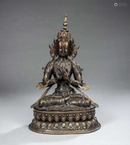BRONZE OF A SEATED TARA ON A SEPARATE LOTUS BASE