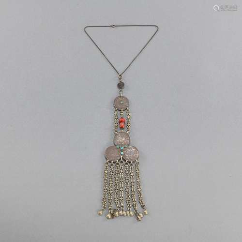 A SILVER PENDANT AND CORAL WITH COINS