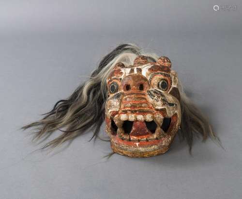 A POLYCHROME PAINTED WOODEN DANCE MASK OF A LION HEAD