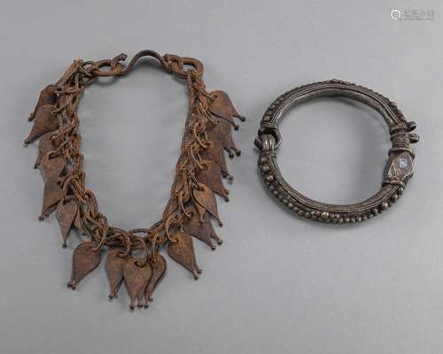 A GROUP OF IRON JEWELLERY FOR ANIMALS OR RITUALS