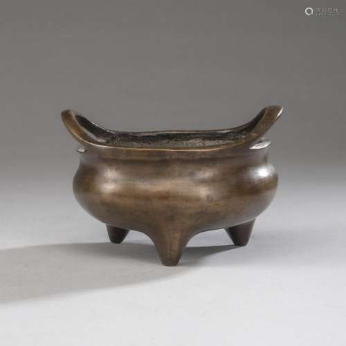 A TWO-HANDLED BRONZE CENSER