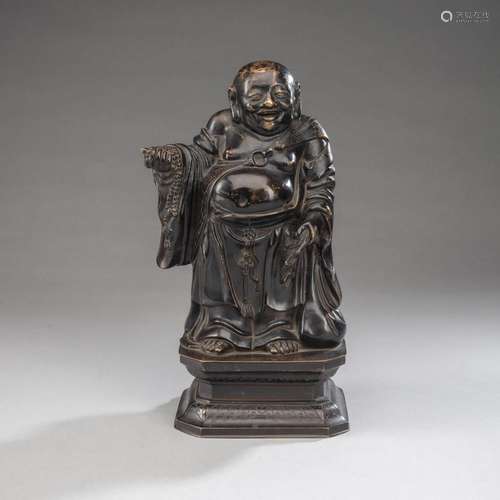 A BRONZE FIGURE OF STANDING BUDAI