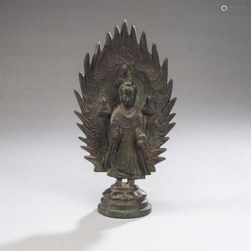 A BRONZE FIGURE OF BUDDHA WITH A FLAMING MANDORLA