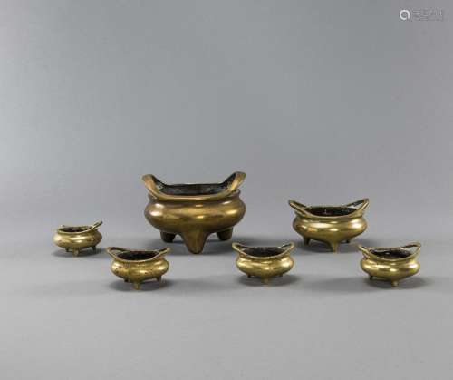 A GROUP OF SIX BRONZE CENSERS OF VARYING SIZES