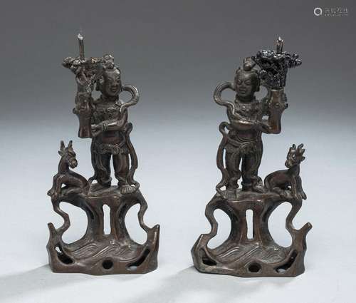 PAIR OF BRONZE CANDLESTICKS IN THE SHAPE OF BOYS (POSSIBLY N...