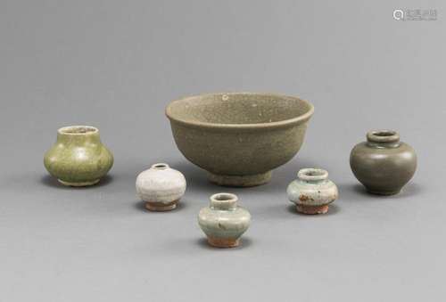 A GROUP OF CELADON GLAZED CERAMICS WITH JARS AND BOWL