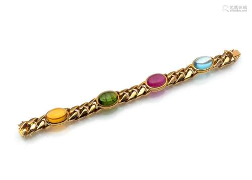 A LARGE STONE AND GOLD BRACELET