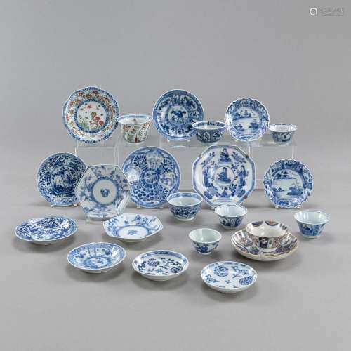 A GROUP OF 22 MOSTLY BLUE AND WHITE PORCELAIN CUPS AND SAUCE...
