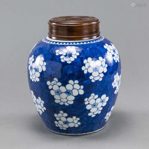 A BLUE AND WHITE PRUNUS GINGER JAR