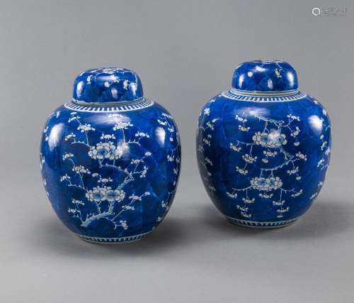 A PAIR OF BLUE AND WHITE PLUM BLOSSOM GINGER JARS