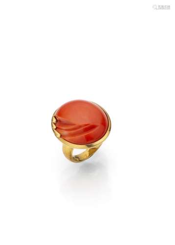 A FINE CORAL AND GOLD RING