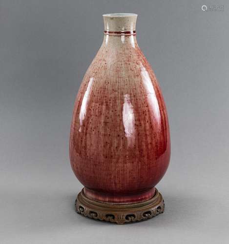 A LARGE PEAR-SHAPED 'OXBLOOD' VASE