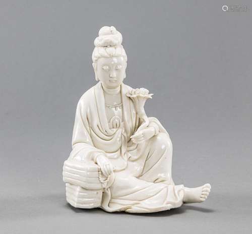 A BLANC-DE-CHINE FIGURE OF SEATED GUANYIN