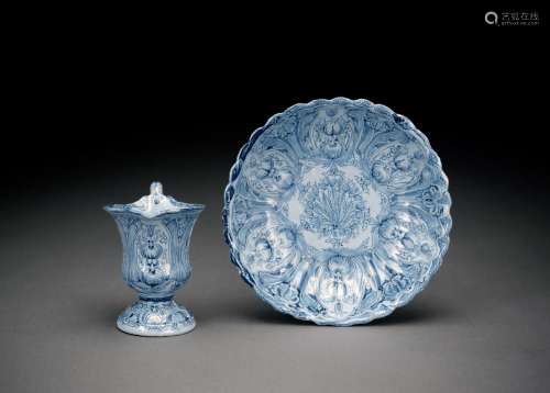 A GERMAN FAYENCE DATED BLUE- GROUND DATED SMALL EWER AND DIS...