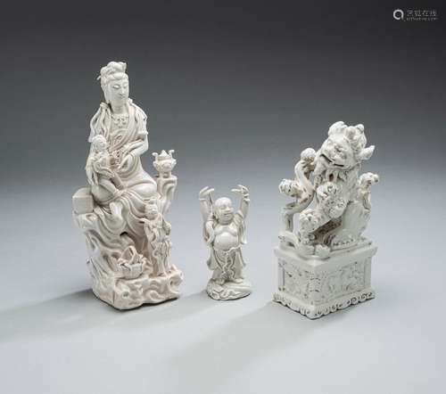 THREE DEHUA FIGURES: PLAYING SHISHI, SONGZI GUANYIN AND A ST...