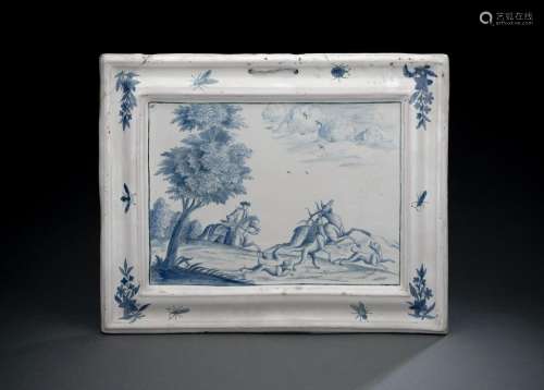 A GERMAN FAYENCE BLUE AND WHITE RECTANGULAR PLAQUE