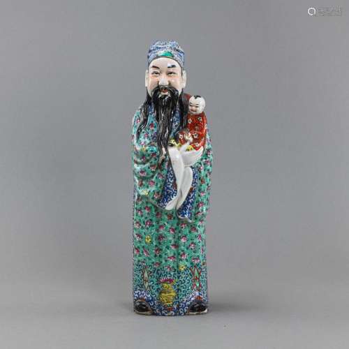 A 'FAMILLE ROSE' PORCELAIN FIGURE OF AN IMMORTAL H...