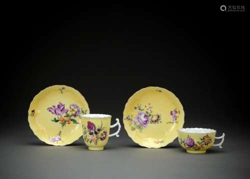 A MEISSEN YELLOW-GROUND COFFEE- CUP, TEACUP AND TWO SAUCERS