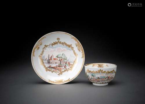 A MEISSEN HAUSMALEREI TEACUP AND SAUCER
