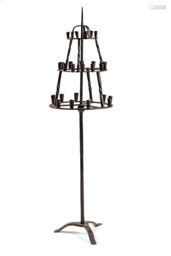 A BAROQUE WROUGHT IRON CANDLESTICK