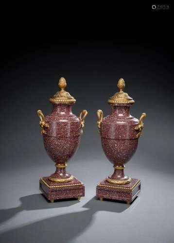 A PAIR OF ORMOLU MOUNTED PORPHYRY VASES AND COVERS