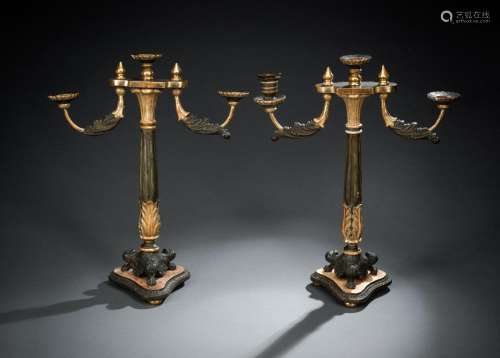 A PAIR OF WOOD AND STUCCO THREE LIGHT CANDELABRA