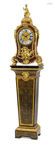 AN ELABORATE BRASS AND ORMOLU MOUNTED BOULLE PENDULE