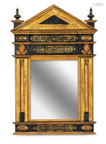 A CARVED GILT AND BLACK PAINTED DECORATIVE FRAME