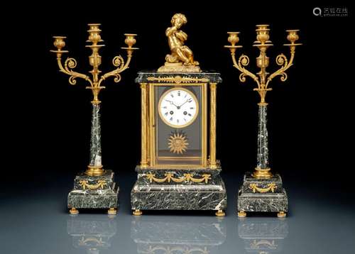 A FRENCH GREEN MARBLE AND BRONZE THREE-PIECE CLOCK GARNITURE