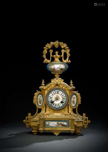 A FRENCH BRONZE AND PORCELAIN PENDULE