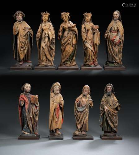 AN IMPORTANT LATE GOTHIC GROUP OF SIX APOSTLES AND THREE FEM...