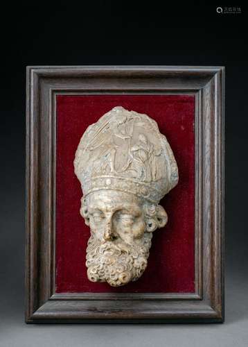 AN ALABASTER HEAD OF A BISHOP