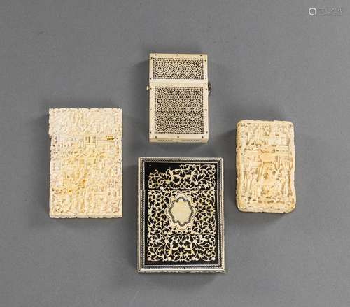 A GROUP OF FOUR FINELY CARVED FIGURAL SCENE IVORY CARD CASES