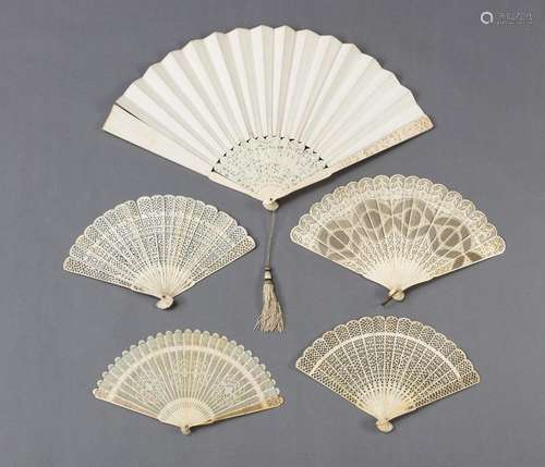 A LARGE BLANK PAPER AND IVORY FAN AND FOUR SMALLER FINELY CA...